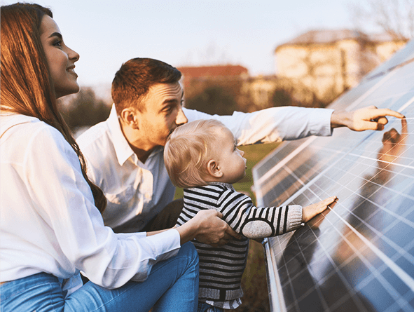 Family viewing a solar panel up close